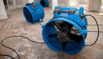 blue axial fans in a flooded room blue axial fans in a flooded room